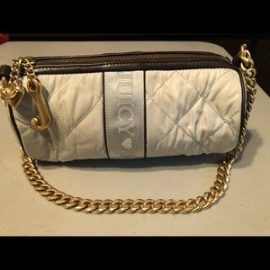 Juicy Couture “Roll” handbag.